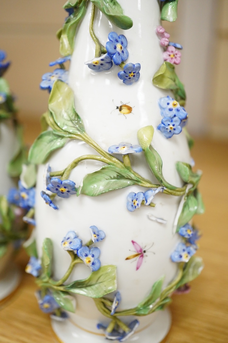 A pair of late 19th century Meissen flower encrusted vases and covers, 20cm high